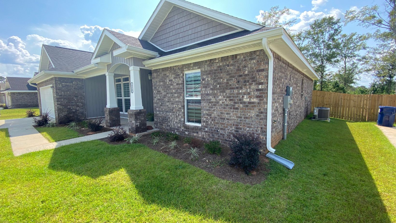 6-inch seamless gutters installed on a home in Mobile, AL by Custom Fit Rain Gutters.