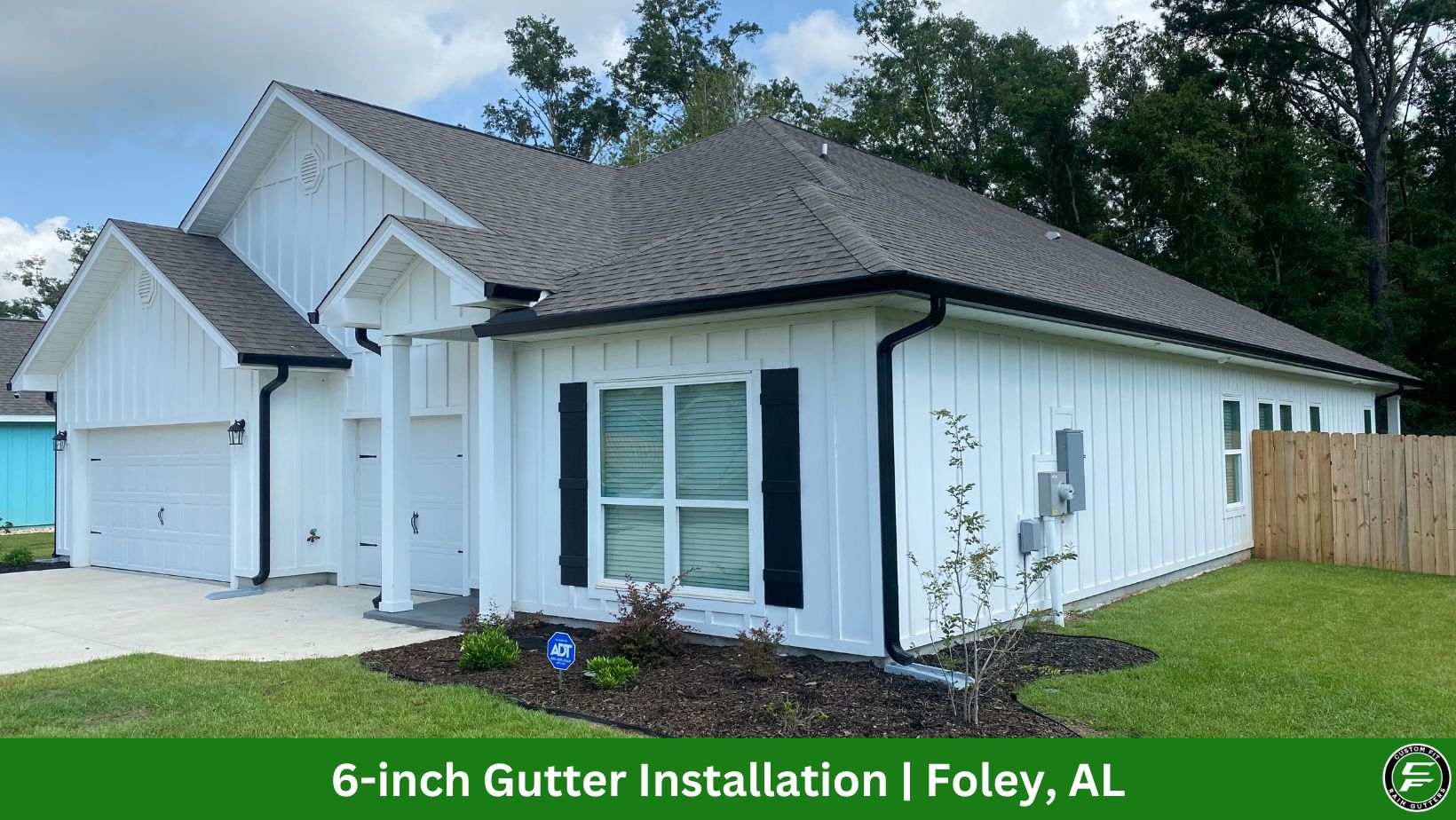 6-inch black seamless gutters installed in Foley, AL.