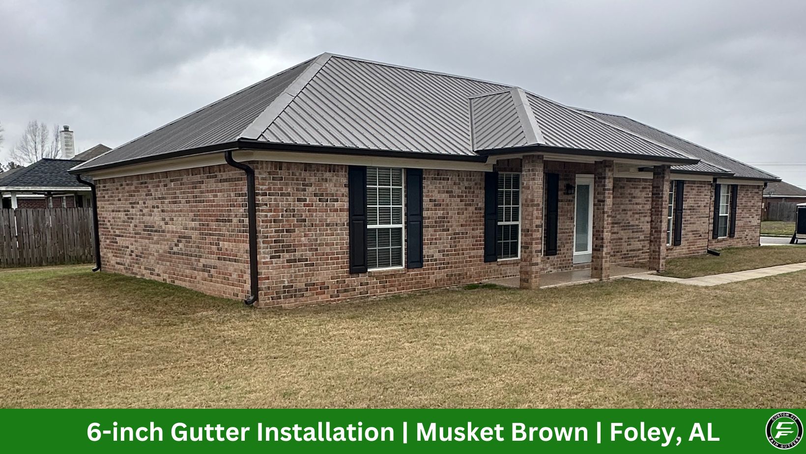 6-inch Musket Brown seamless gutter installation on a home in Foley, AL by Custom Fit Rain Gutters.