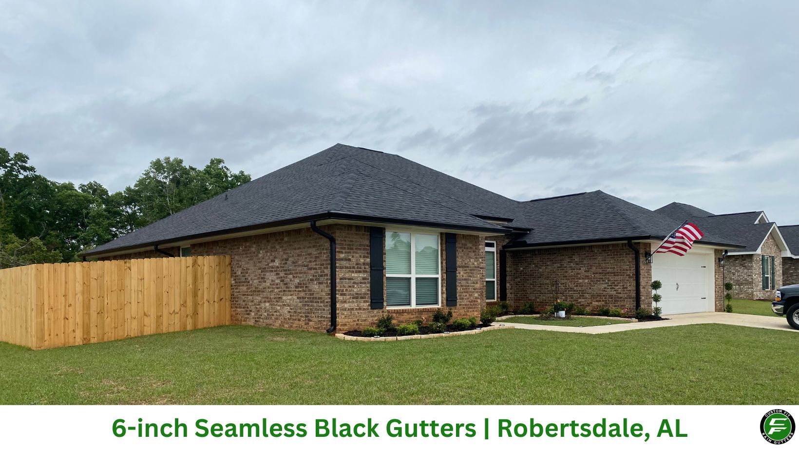 6-inch black seamless gutters installed on a home in Robertsdale, AL